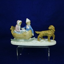 Figurine Dog Pulling Sled with Children Collectible Porcelain by Meico Inc - £29.24 GBP