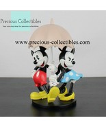 Extremely rare! Mickey and Minnie in the rain. Walt Disney statue. - $635.98 CAD
