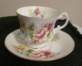 Elizabethan Fine Bone China Cup and Saucer  Pink, Yellow & Red Rose - $14.36