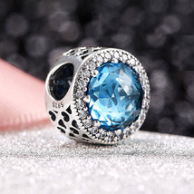 925 Sterling Silver Radiant Hearts with Sky-Blue Crystal Charm Bead - $16.66