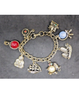 LERU Vintage Charm Bracelet Gold Tone 8 Charms Ships Train Buddha Bicycl... - £19.53 GBP