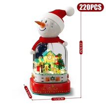 Christmas Snowman House Rotating Light Music Box Model Building Blocks 2... - $33.99