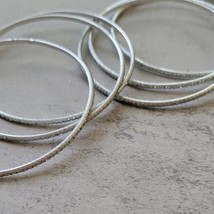 Light Silver Glitter Thin Metal Bangles Metallics Stack of 6 - $258.82 MXN