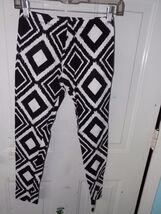 CHARLOTTE RUSSE BLACK/WHITE PRINT LEGGINGS SIZE L WOMEN'S EUC  - $21.00