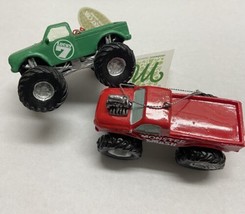 Midwest CBK Green and  Red Monster Truck Resin Christmas Ornaments Lot of 2 - $17.27