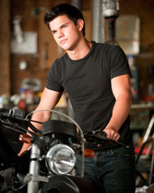 Taylor Lautner In T-Shirt By Motorbike 16x20 Canvas Giclee - $69.99