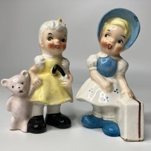 Ucagco Vtg Figurine Set of 2 Girls Yellow Teddy Bear Blue Bonnet Suitcase READ - £14.66 GBP