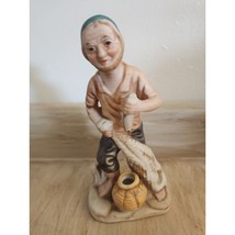 Vintage Porcelain Fisherman Figurine Holding Fish 6 1/4 High - $168.21 MXN