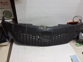 09 10 Toyota Corolla upper grill assembly OEM 53111-02450 - £19.13 GBP