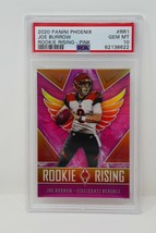 Authenticity Guarantee 
2020 Panini Phoenix #RR1 Joe Burrow Rookie Rising Pin... - £479.60 GBP