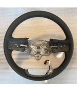 OEM original black leather steering wheel for some GMC trucks. AT4 khaki... - $1,410.43 MXN