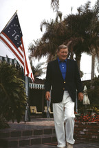 John Wayne by American flag Newport Beach home 24x18 Poster - $23.99