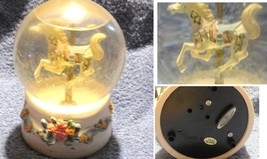 Waterglobe CAROUSEL HORSE INSIDE AND A IT PLAYS MUSIC - $8.00