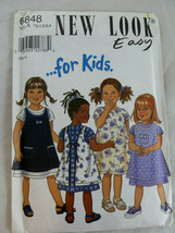 Simplicity New Look 6848 Girls dresses and Pinafore Apron size 1/2 1 2 3... - $7.91