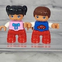 Lego Duplo Figures People Lot of 2 Girl and Boy Red Pants  - $9.89