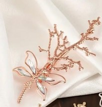 Dragonfly branch rose gold hair clip - $225.18 MXN