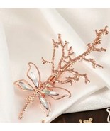 Dragonfly branch rose gold hair clip - $223.49 MXN