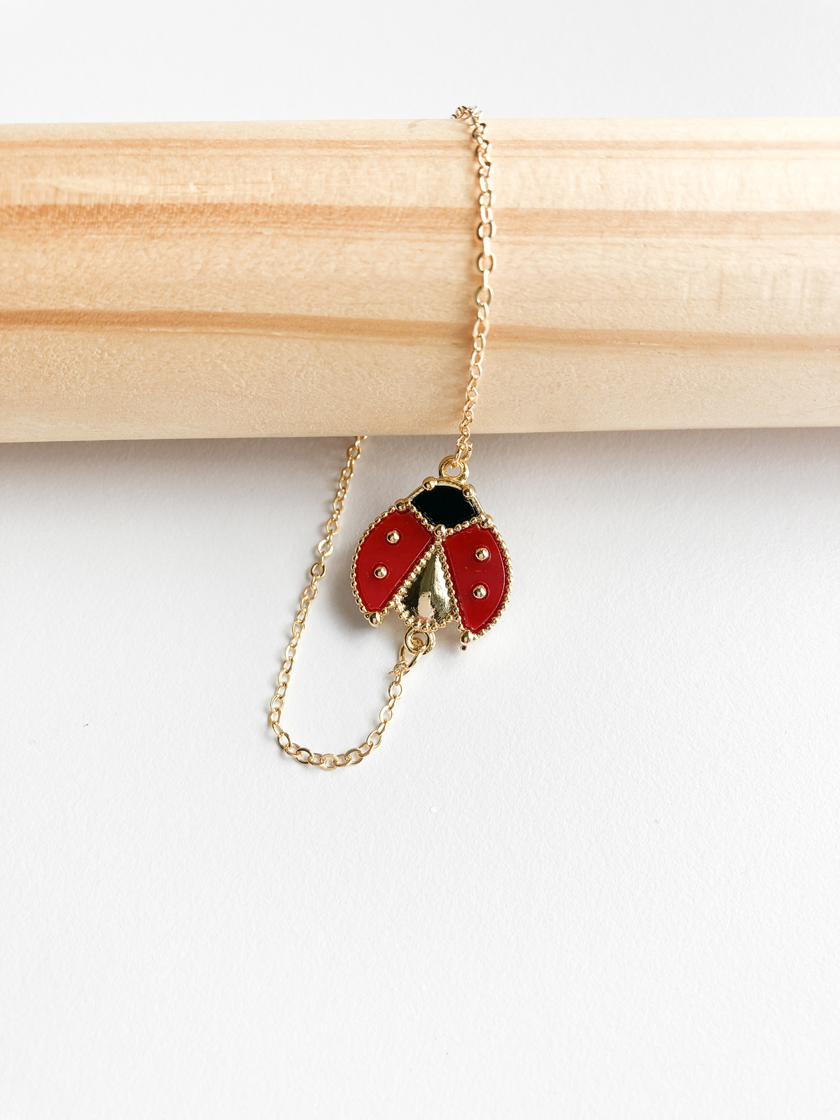 Carnelian and Onyx Ladybug Bracelet in Gold