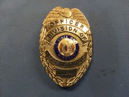OFFICER DIVISION OF ADULT INSTITUTIONS D.O.C.H.R STATE OF MISSOURI BADGE - $137.12 CAD