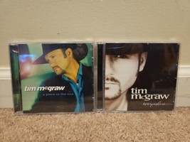 Lot of 2 Tim McGraw CDs: Everywhere, A Place in the Sun - $8.99