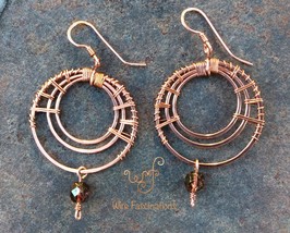 Handmade copper earrings: large concentric hoops with wire weave and glass bead  - £43.02 GBP