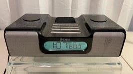 I Home Black FM Alarm Clock Radio with IPod Docking Station. - $20.78