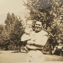 Found Black And White Photo Dad And Baby Girl Posing - £7.08 GBP