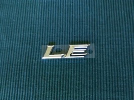  LE chrome emblem new OEM - £10.99 GBP