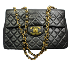 Authenticity Guarantee 
1995 Chanel Jumbo XL Maxi Black Quilted Lambskin Sing... - $6,300.00