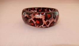 Awesome vintage lucite modernist pink tinged animal print bangle bracelet - $12.00