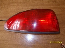 1997 1996 1995 FORD CONTOUR LEFT TAIL LIGHT OEM USED ORIGINAL FORD PART - $157.41