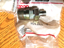 HOLDER  KOMATSU DK131116-7600 Onan 186-1115 genuine Komatsu - $469.08 MXN