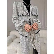 2022 the new retro chic tweed trimmed jacket is a slimming slacker suit with a premium thumb200