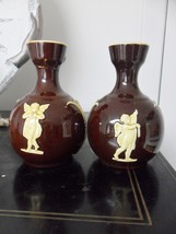 Pair of Staffordshire vases, dark glazed with cream relief decorations [84c]  - £107.16 GBP
