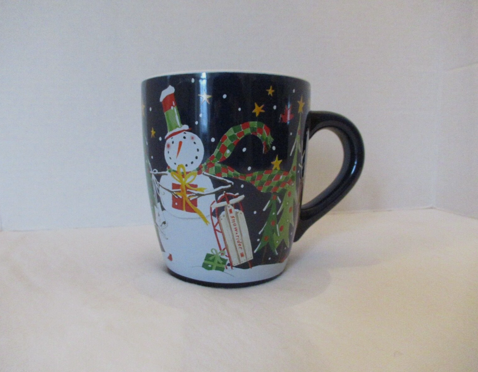 Primary image for Anne Tavoletti mug holiday 16 oz blue snowman sled trees Housewares Intl