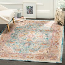 SAFAVIEH Aria Collection Area Rug - 9' x 12', Blue & Orange, Boho Chic Medallion - $393.99