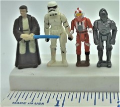 Star Wars Micro-Figurines Lot of 4 ( including Obi-Wan, Trooper, pilot, ... - $9.89