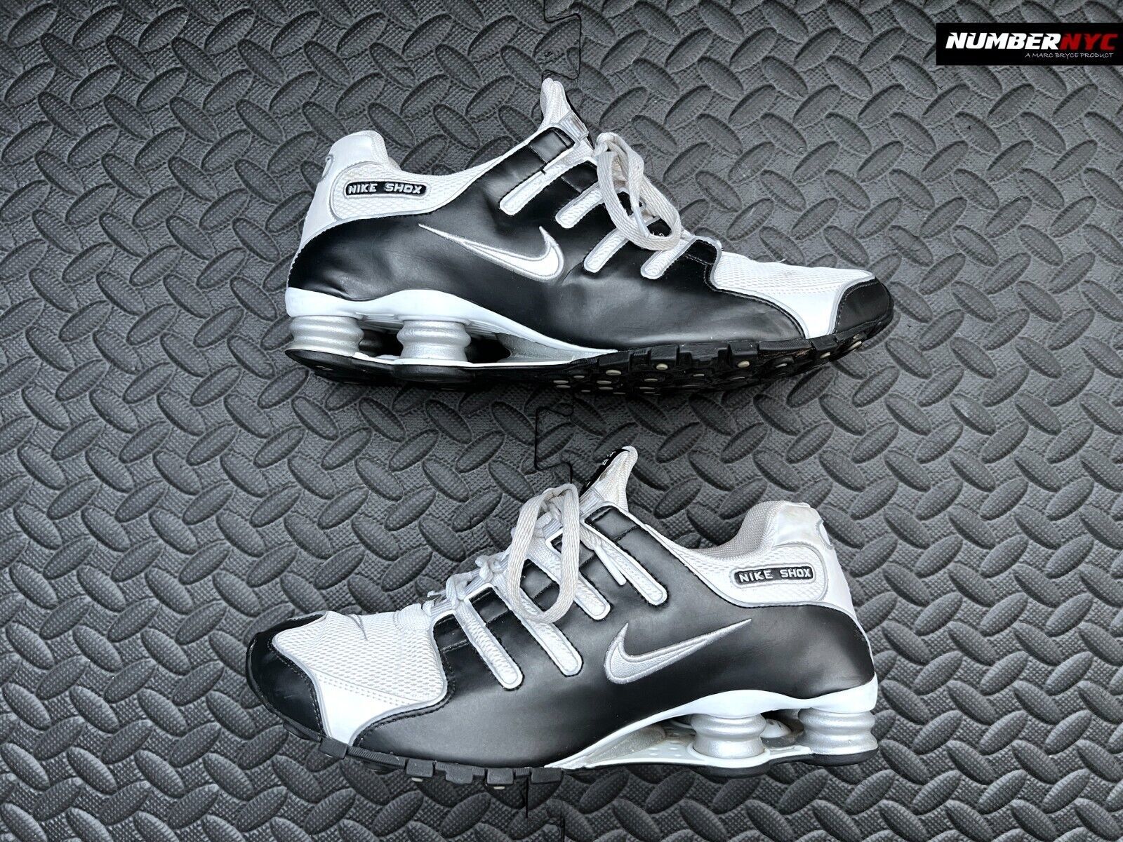 Primary image for Authenticity Guarantee 
Nike Shox 2009 NZ ID White Black Silver Running Shoes...
