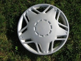One genuine 1997 1998 Mitsubishi Mirage 13 inch hubcap wheel cover mint - $20.75