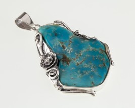 Amazing Turquoise Sterling Silver Pendant Set on a Floral Frame - $178.19