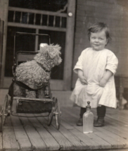 Cute Dog In Baby Carriage Little Girl Bottle On Porch RPPC Real Photo Postcard - £14.80 GBP