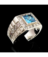 Sterling silver ring with a Princess cut Blue CZ and 26 small White CZ h... - $163.41 CAD