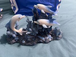 Dolphins Swimming Around Coral Statue - $14.85