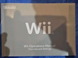 Wii Operations Manual (Soft Cover) In English, French &amp; Spanish - $10.16
