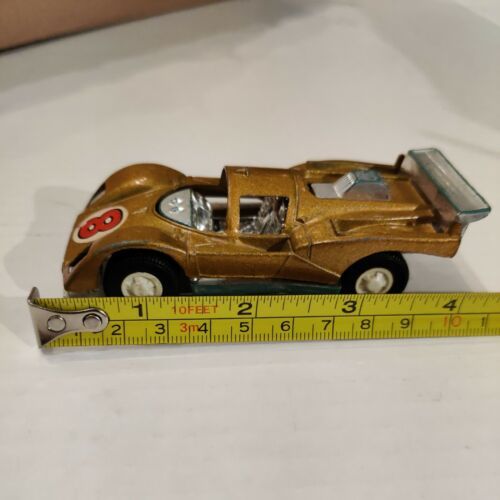 Tootsie Toy Gold FERRARI AUTO 4” Long  - $17.82