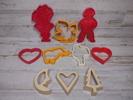 Lot of 10 Vintage Plastic Cookie Cutters Santa Elephant Maple Leaf Moon Heart - £7.23 GBP