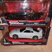 Fast &amp; Furious Diecast lot of 2  Brians cars Toyota Supra &amp; Nissan Skyli... - $29.50