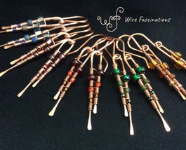 Handmade copper earrings: long slender frames wire wrapped with glass beads - $24.00