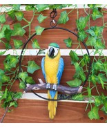 Ebros Hanging Blue And Gold Macaw Perching on Branch in Metal Round Ring... - $54.66 CAD