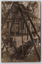 RPPC Lovely Couple Man Woman on Face to Face Swing Glider c1908 Postcard... - $12.95